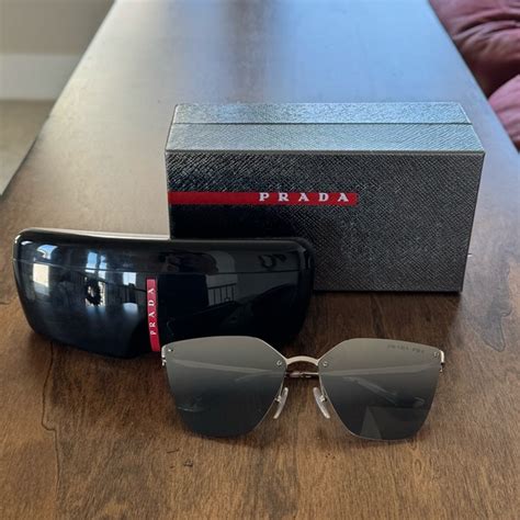 Prada PR 68TS 